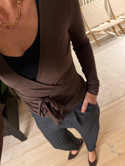 NIA JERSEY WRAP BLUSE