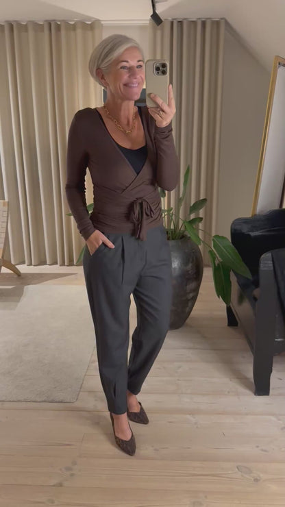 NIA JERSEY WRAP BLUSE